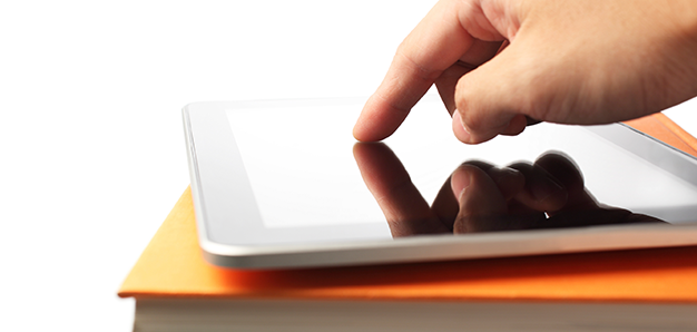 Close up of someone pointing on a tablet device.